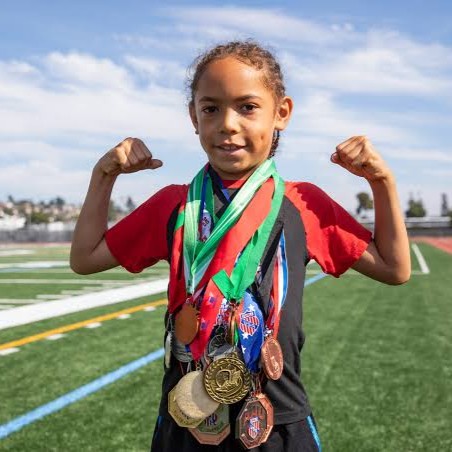 kid-with-medals